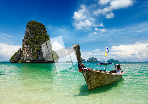 Image of Long tail boat on beach, Thailand