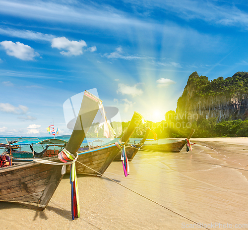 Image of Long tail boats on beach, Thailand