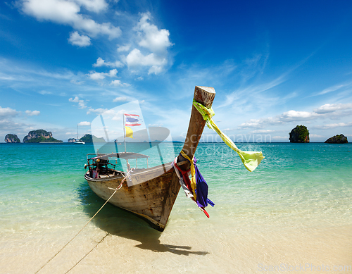 Image of Long tail boat on beach, Thailand