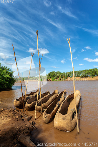 Image of wooden coarse boat on mystical Omo river, Ethiopia