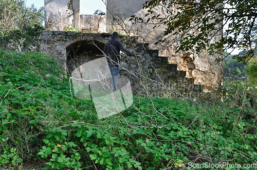 Image of man abandoned rural house