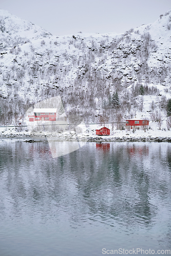 Image of Rd rorbu houses in Norway in winter