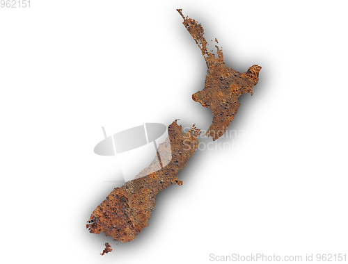 Image of Map of New Zealand on rusty metal