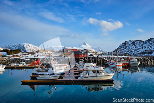 Image of Fishing boats and yachts on pier in Norway