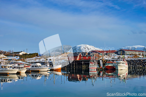 Image of Fishing boats and yachts on pier in Norway