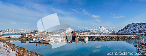 Image of Fishing boats and yachts on pier in Norway