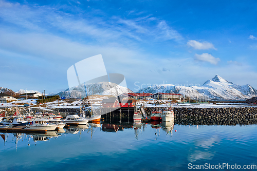 Image of Fishing boats and yachts on pier in Norway