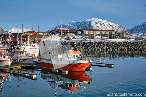 Image of Fishing boats and yachts on pier in Norway