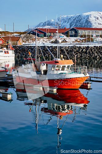 Image of Fishing boats and yachts on pier in Norway