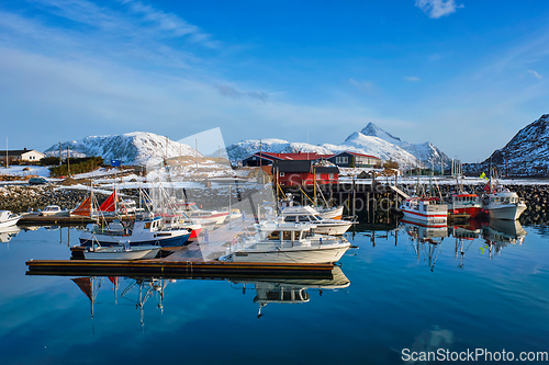 Image of Fishing boats and yachts on pier in Norway