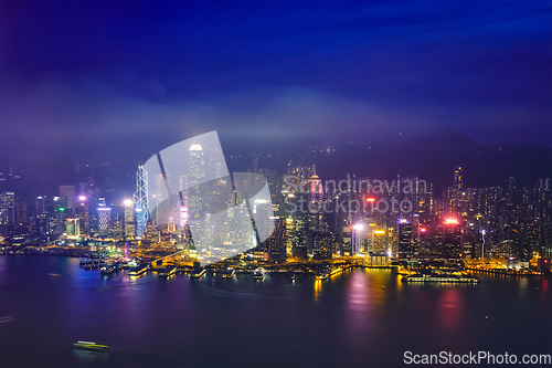 Image of Aerial view of illuminated Hong Kong skyline. Hong Kong, China