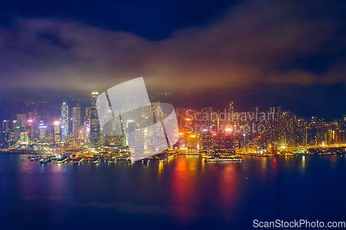 Image of Aerial view of illuminated Hong Kong skyline. Hong Kong, China