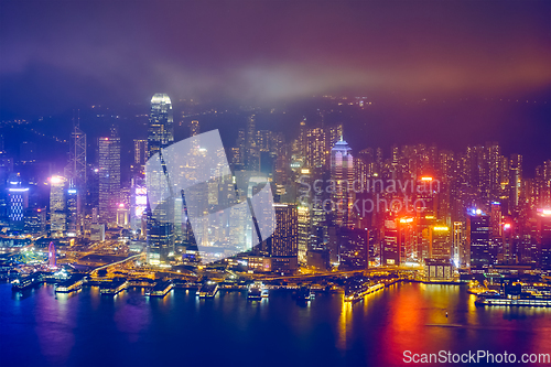 Image of Aerial view of illuminated Hong Kong skyline. Hong Kong, China