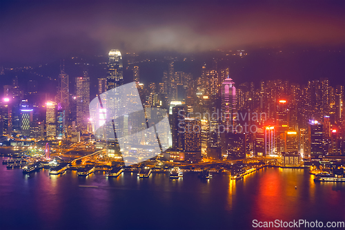 Image of Aerial view of illuminated Hong Kong skyline. Hong Kong, China