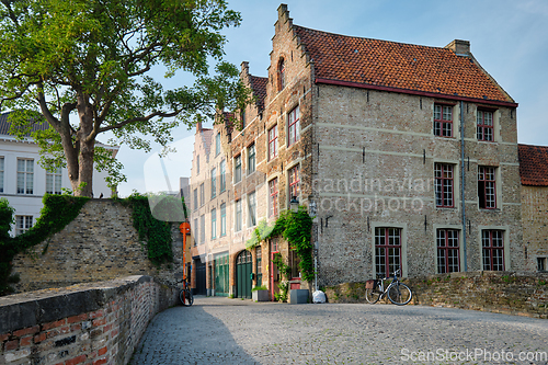 Image of Brugge canal and old houses. Bruges, Belgium