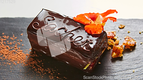 Image of A piece of Sacher cake. Shallow dof.