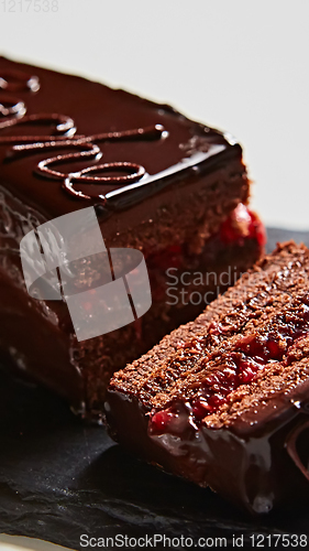 Image of A piece of Sacher cake. Shallow dof.