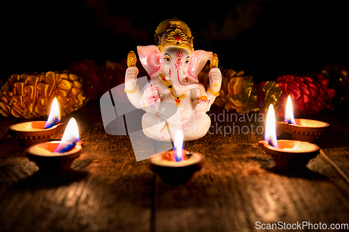 Image of Ganesha with Diwali lights