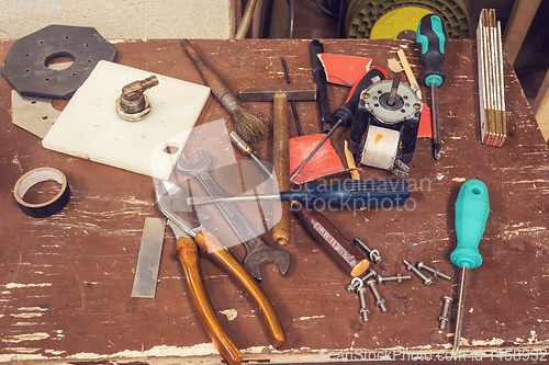 Image of tools on table in workshop room