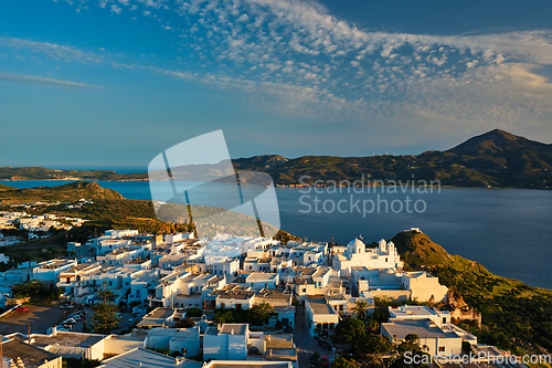 Image of View of Plaka village on Milos island on sunset in Greece