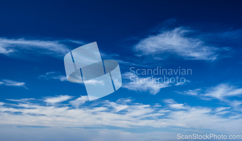 Image of Blue clear sky with clouds