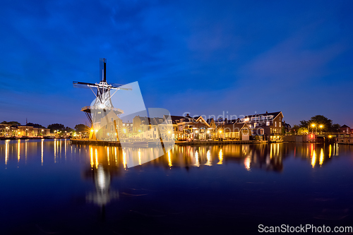 Image of Harlem landmark windmill De Adriaan on Spaarne river. Harlem,