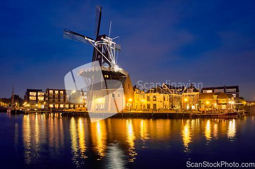 Image of Harlem landmark windmill De Adriaan on Spaarne river. Harlem,