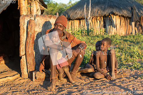 Image of Wrinkled Himba old man and children, Namibia Africa