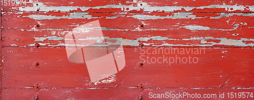 Image of Old wood board painted red. Banner background