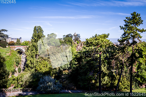 Image of Sibyl temple and pond in Buttes-Chaumont Park, Paris