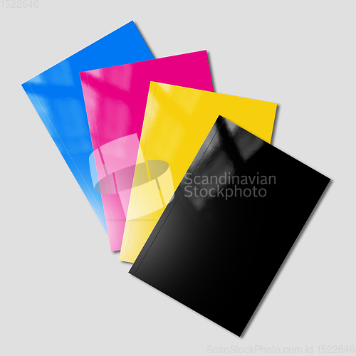 Image of CMYK booklets set mockup on grey background