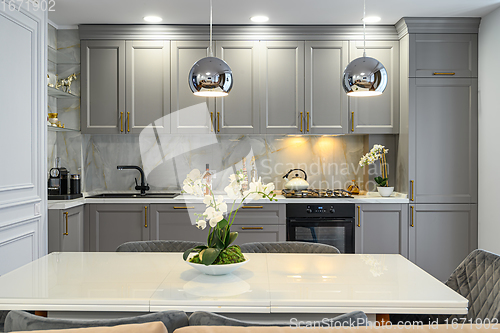 Image of Grey and white luxury kitchen in modern style