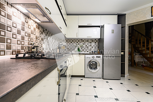 Image of Black and white modern kitchen interior