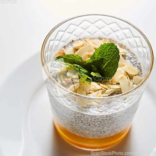 Image of Mango yogurt with chia seeds for healthy breakfast on a white background