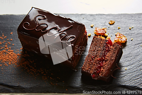 Image of A piece of Sacher cake. Shallow dof.