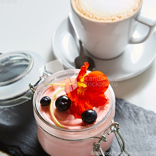 Image of Fresh strawberry yoghurt dessert in glass, selective focus