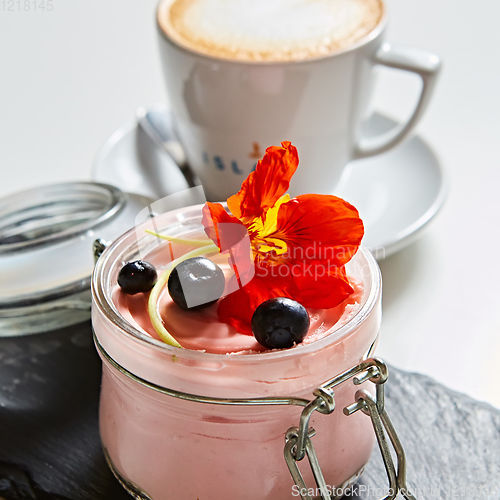 Image of Fresh strawberry yoghurt dessert in glass, selective focus