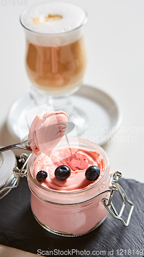 Image of Fresh strawberry yoghurt dessert in glass, selective focus.