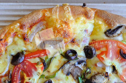 Image of pizza with vegetables