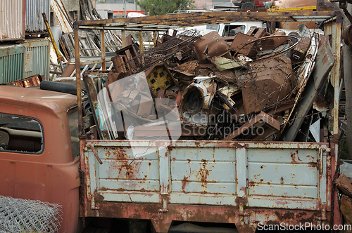 Image of rusty scrap metal at a junkyard