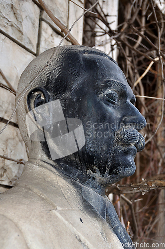 Image of statue of man with mustache