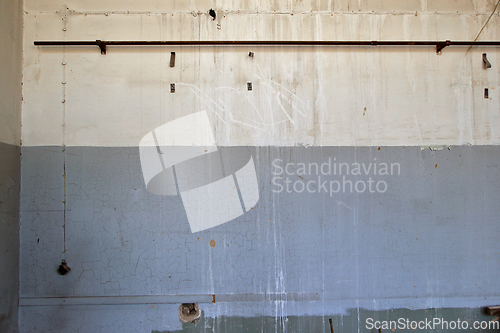 Image of weathered wall in abandoned industrial interior