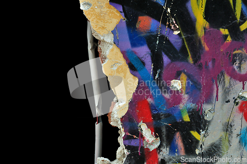 Image of broken wall with smudged paint