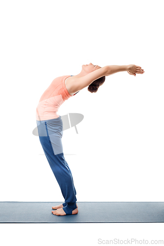 Image of Sporty fit woman practices yoga asana Anuvittasana