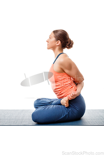 Image of Sporty woman doing Ashtanga Vinyasa yoga asana