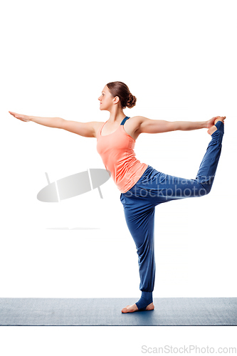 Image of Woman doing yoga asana Natarajasana