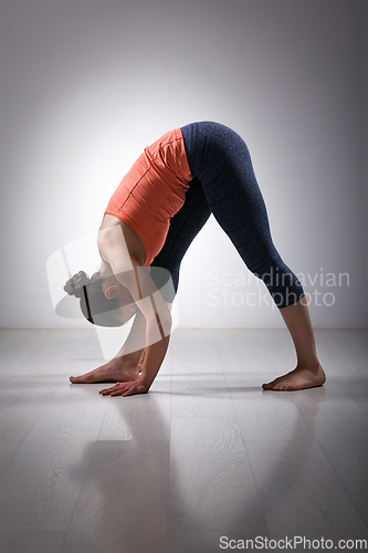 Image of Woman stretching in Ashtanga Vinyasa yoga asana