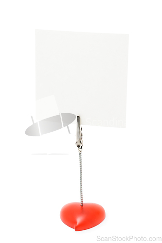 Image of Blank note stand with heart shaped base isolated