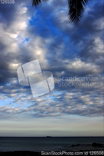 Image of cloudy hill lagoon and coastline in  nosy be