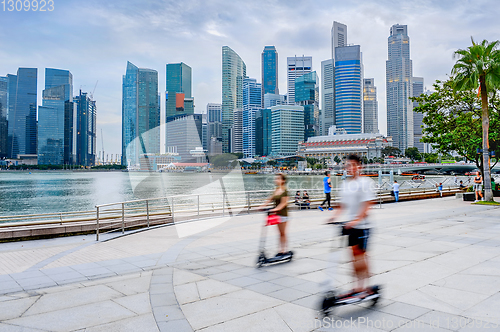 Image of Modern Singapore  people eco transport